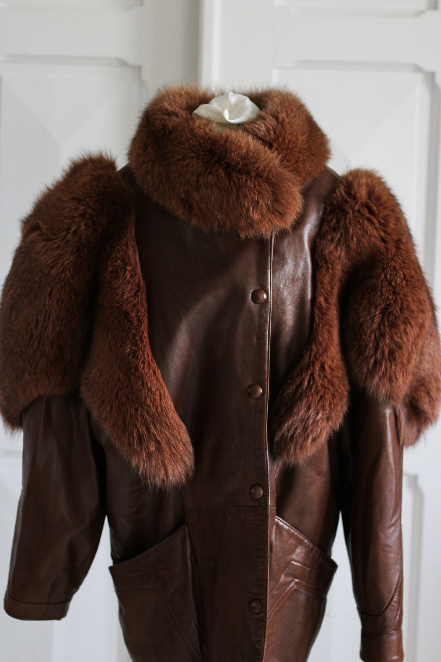 Blouson cuir et fourrure