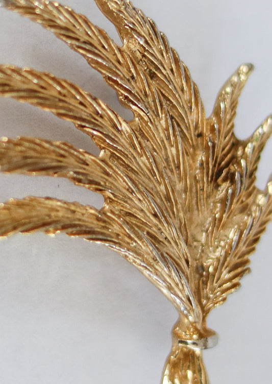 Broche feuillage en métal doré