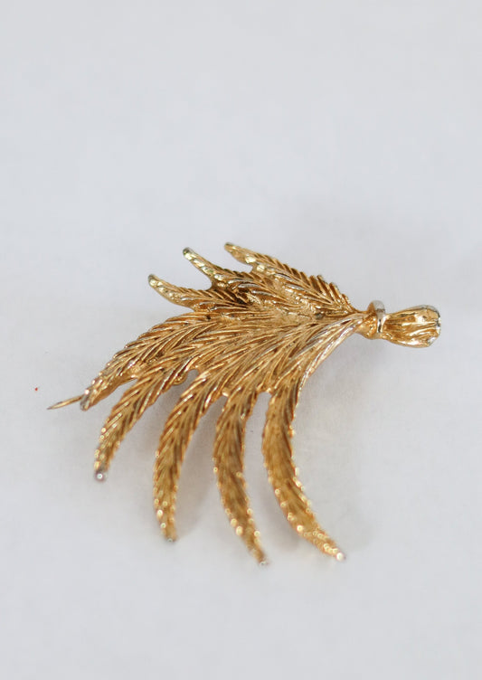 Broche feuillage en métal doré