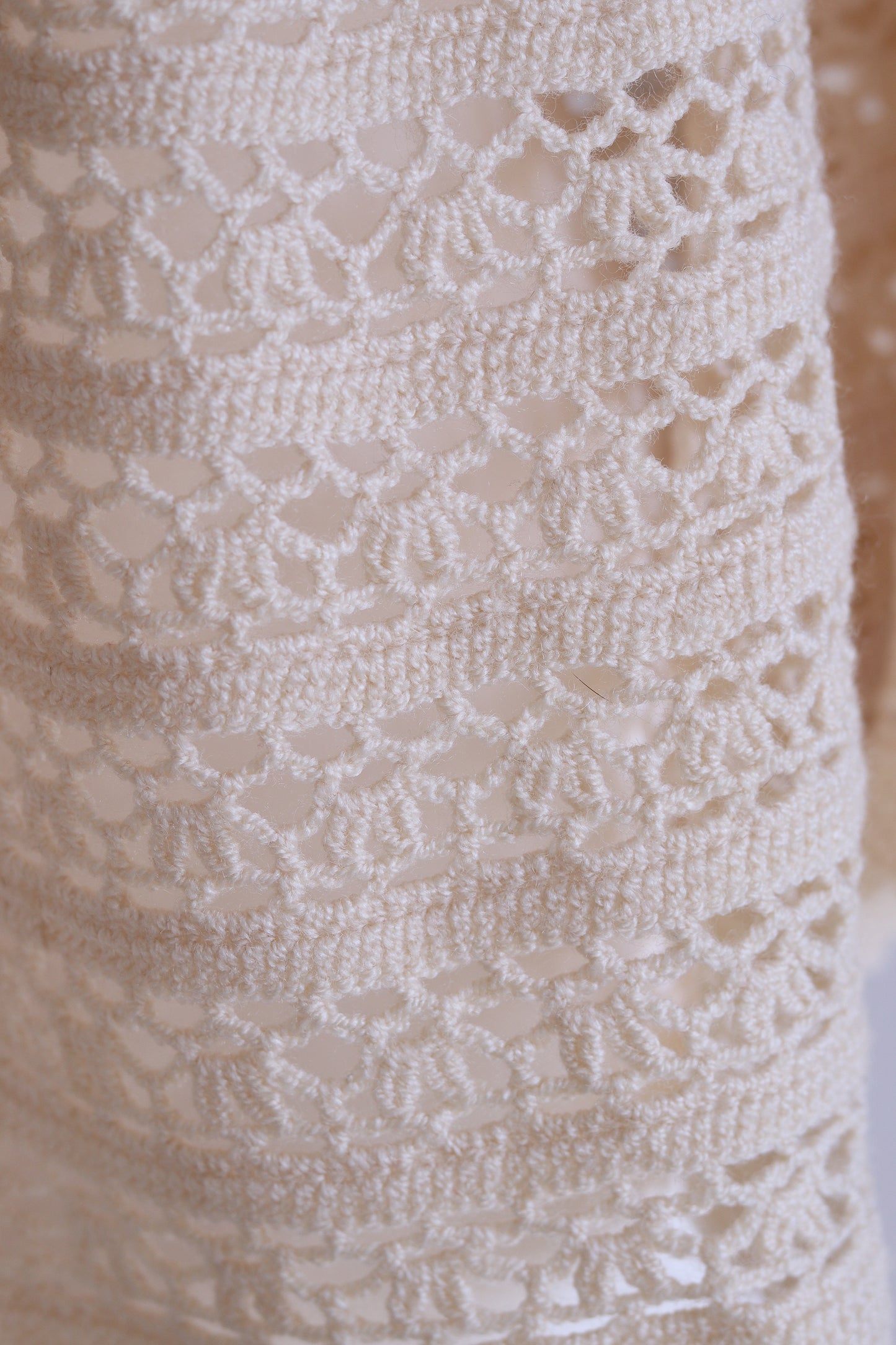 Capeline en tricot ajouré