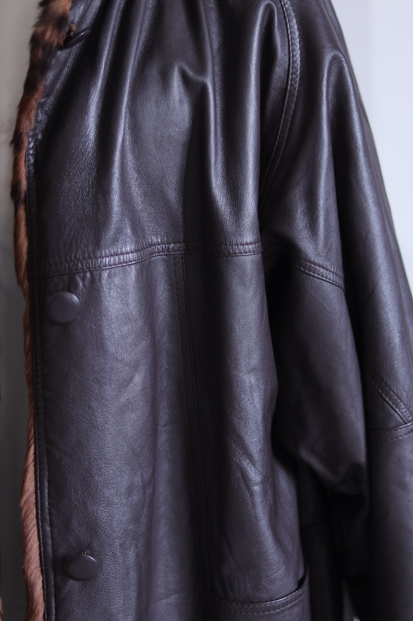 Manteau réversible en fourrure et cuir