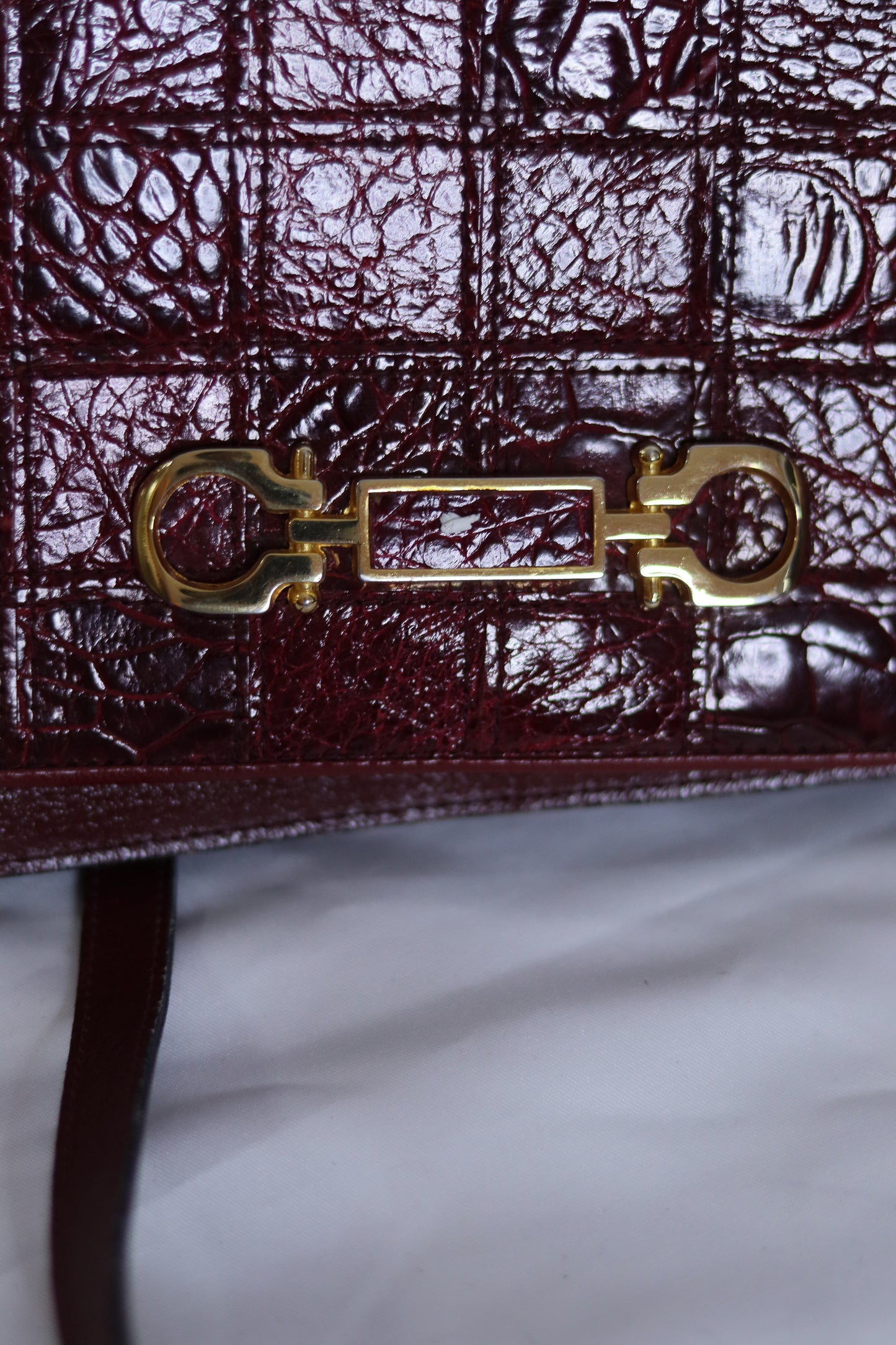 Sac pochette en cuir bordeaux