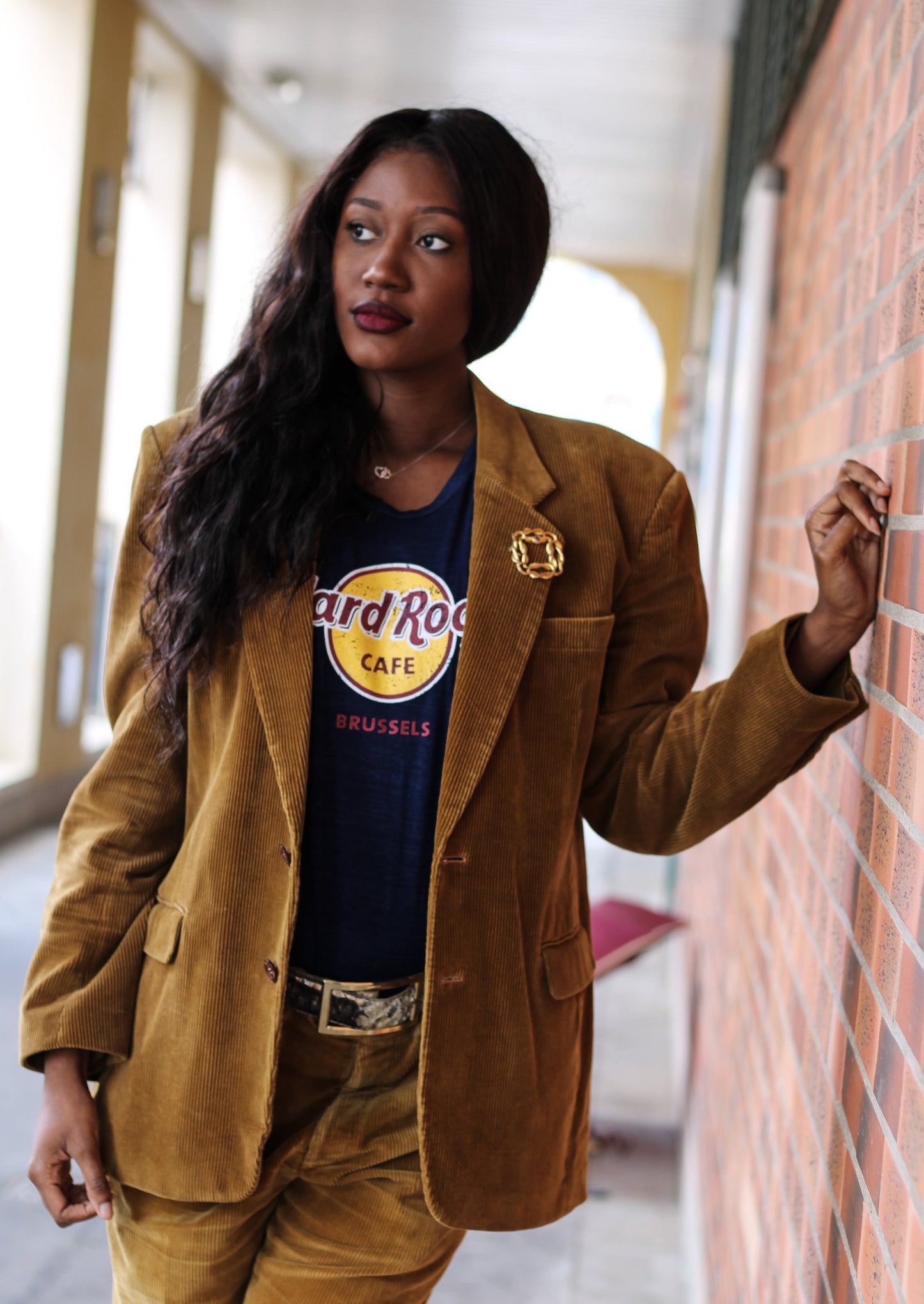 Broche en métal doré Lions International