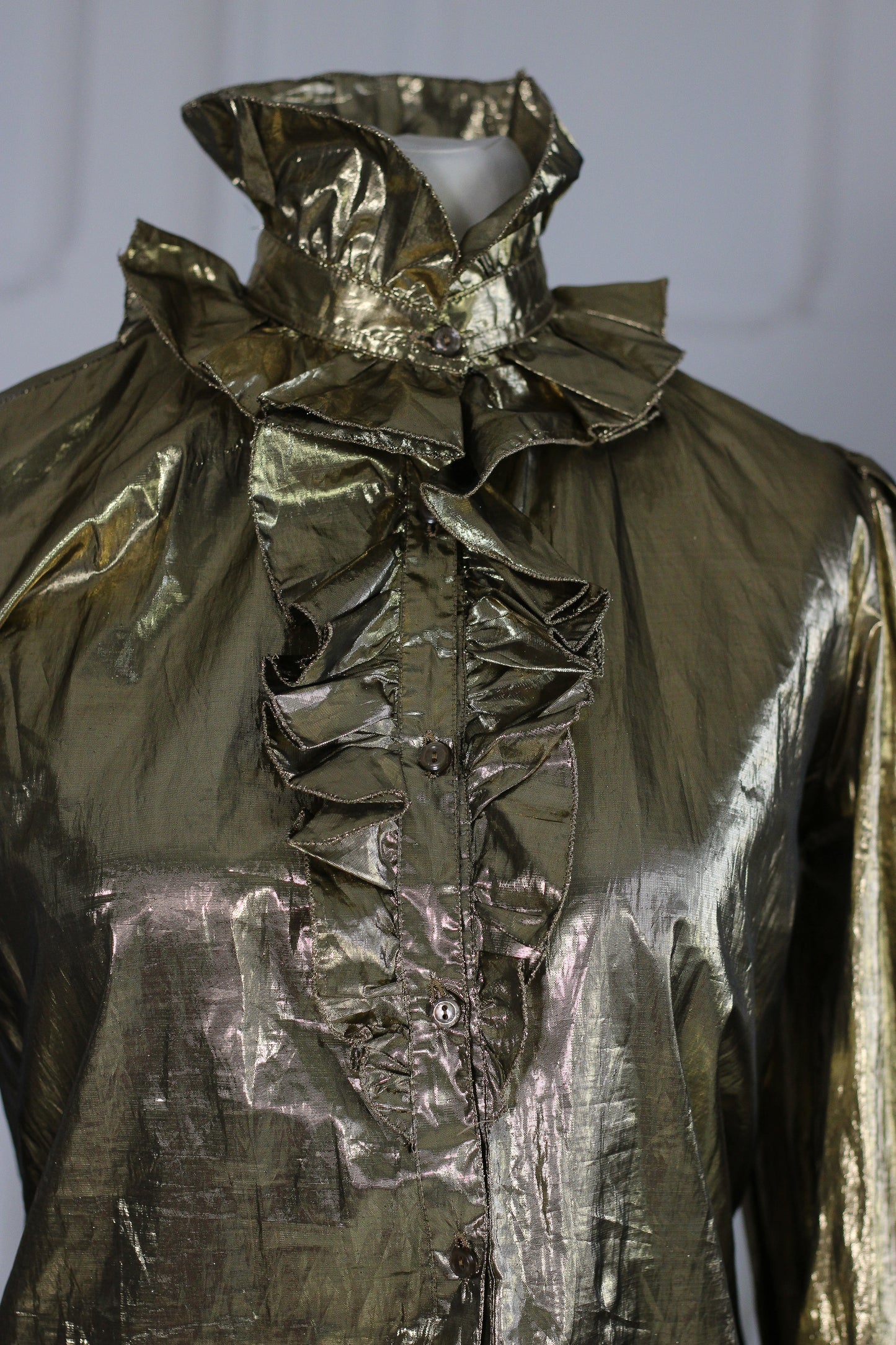 Caselli blouse lamée dorée