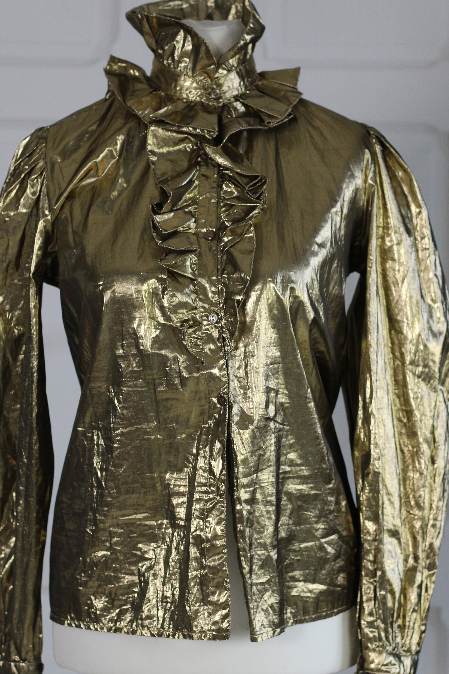 Caselli blouse lamée dorée
