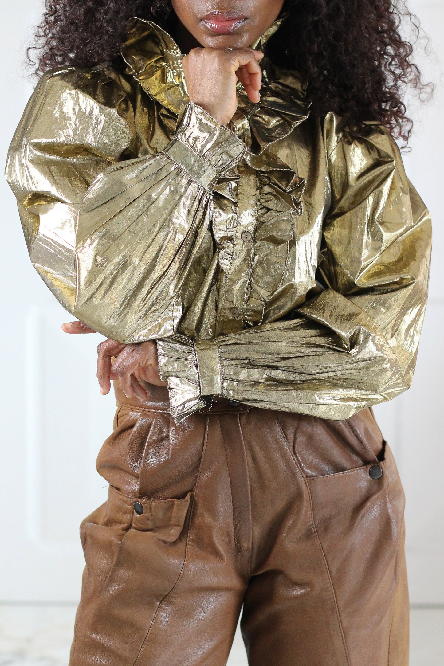 Caselli blouse lamée dorée