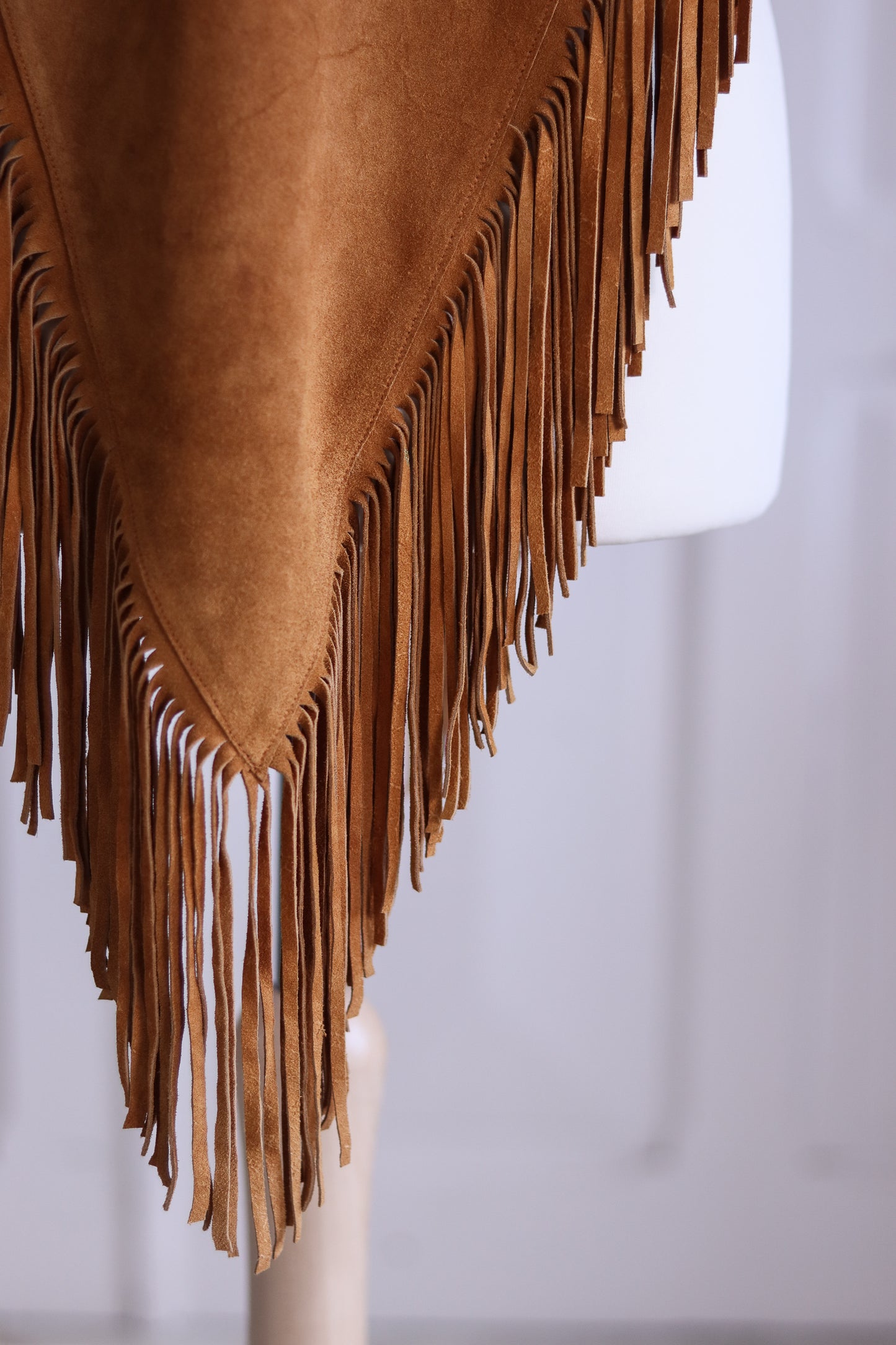 Poncho à franges cuir daim