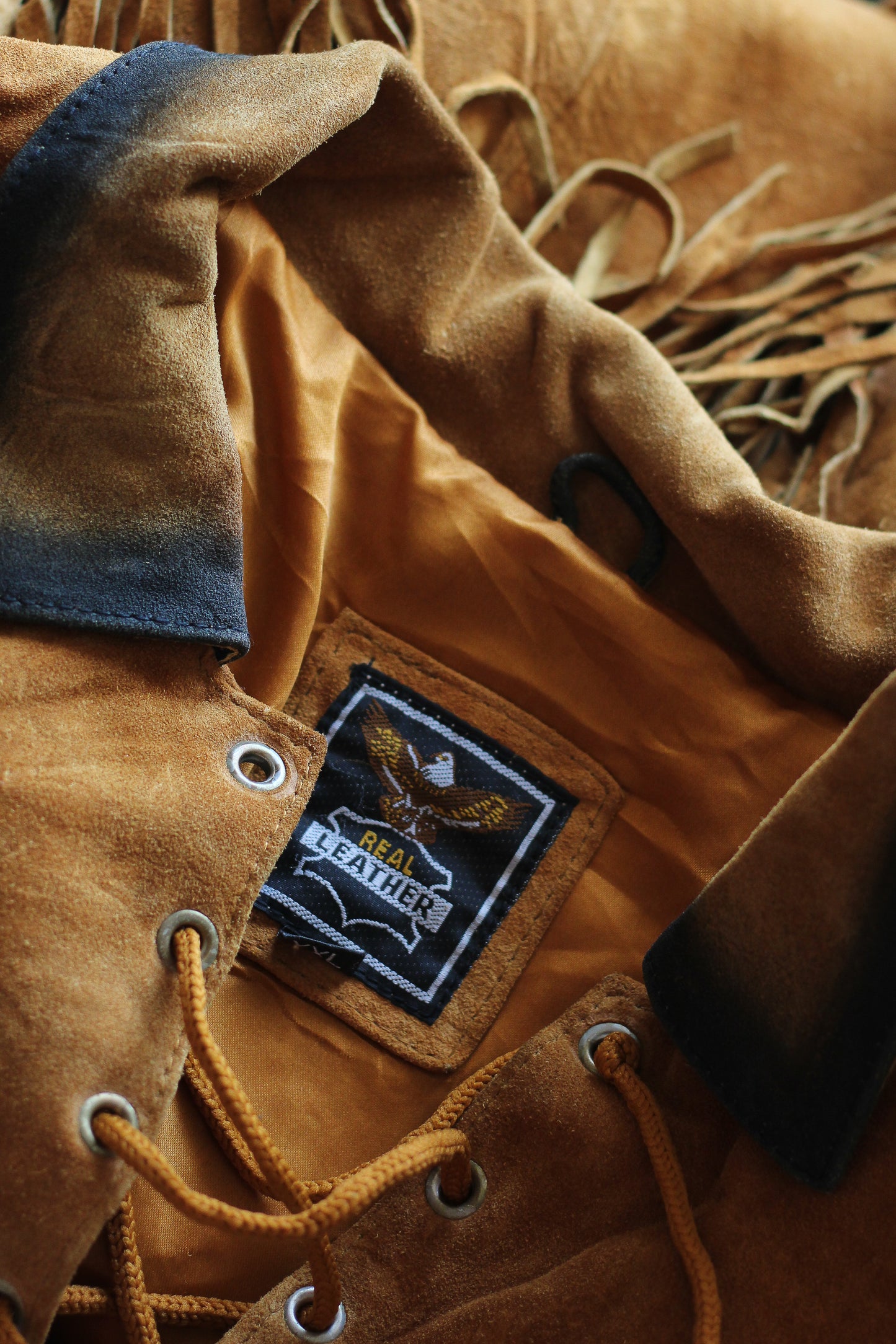 Poncho en cuir à franges esprit western 70s