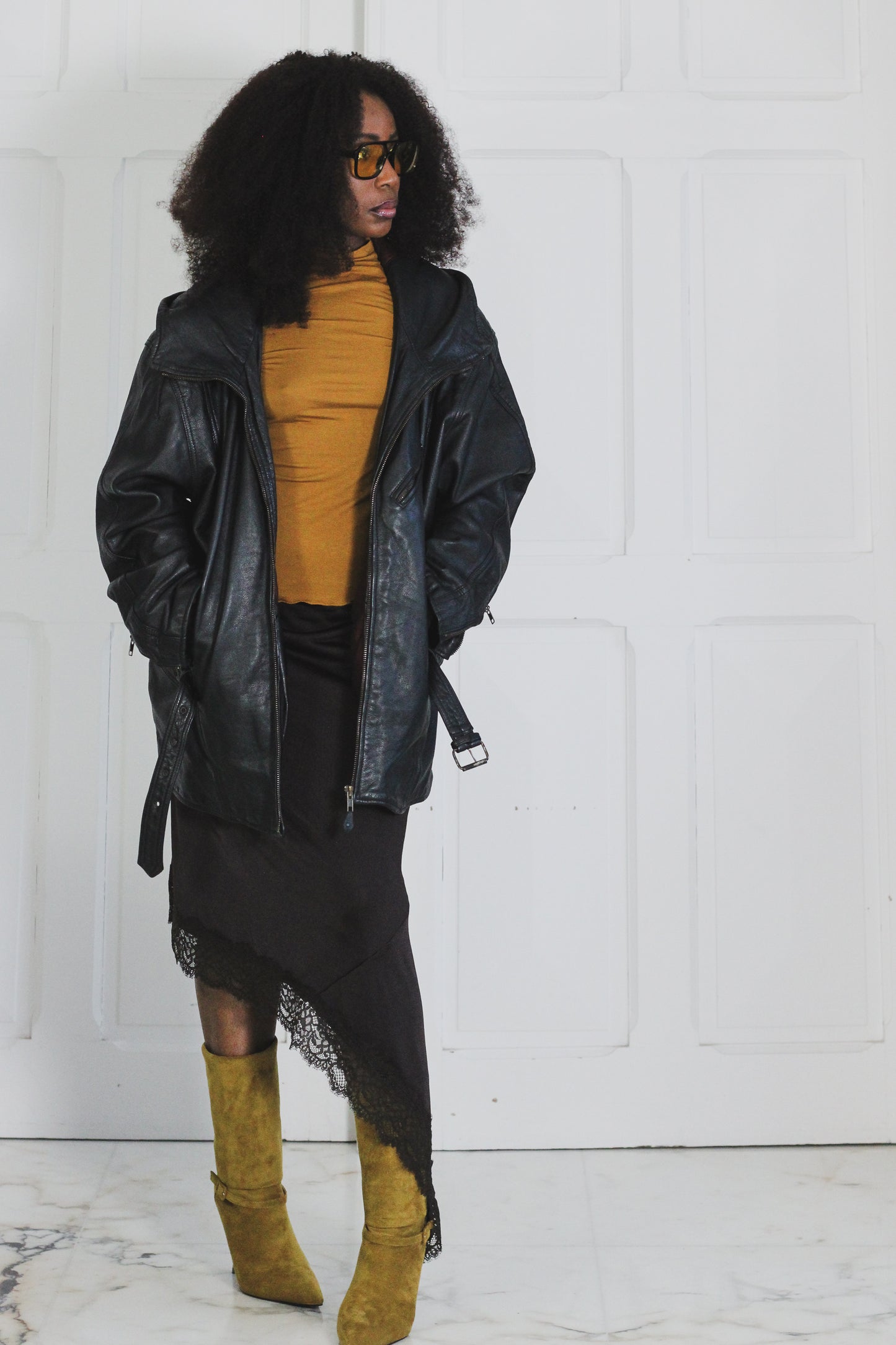Blouson cuir avec capuche