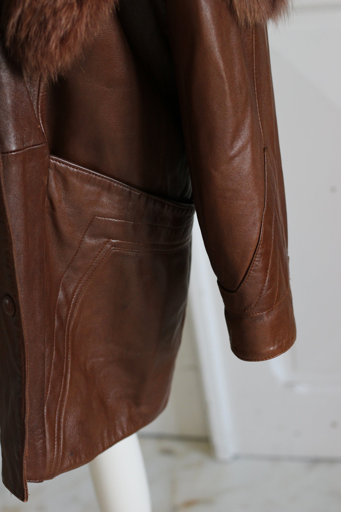 Blouson cuir et fourrure