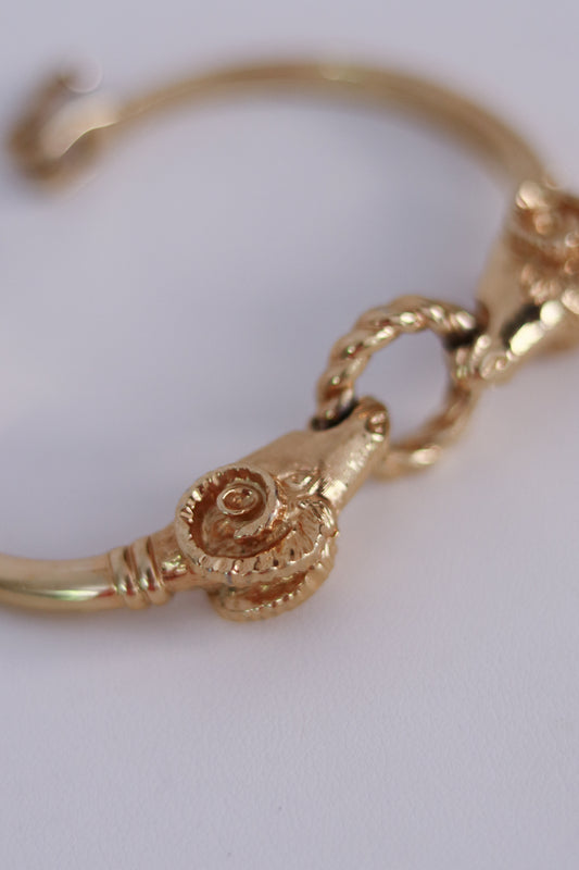 Bracelet doré têtes de béliers
