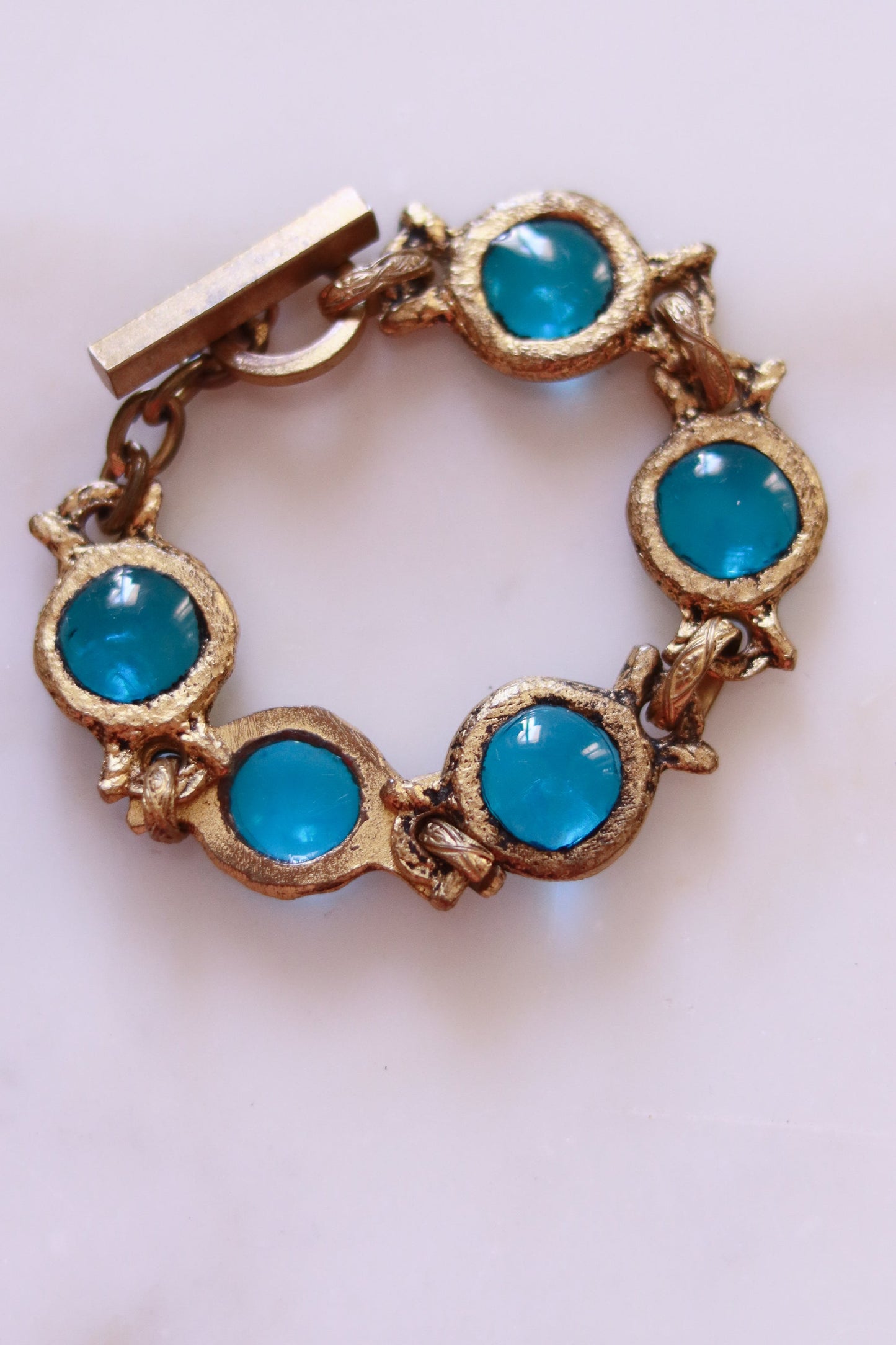 Bracelet vintage doré à cabochon