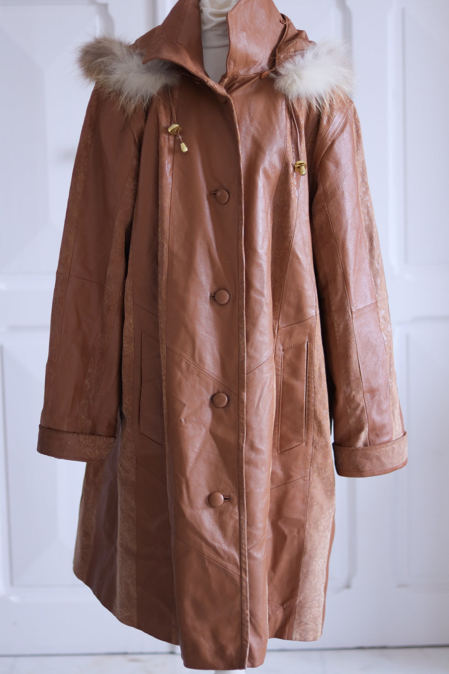 Manteau à capuche en cuir