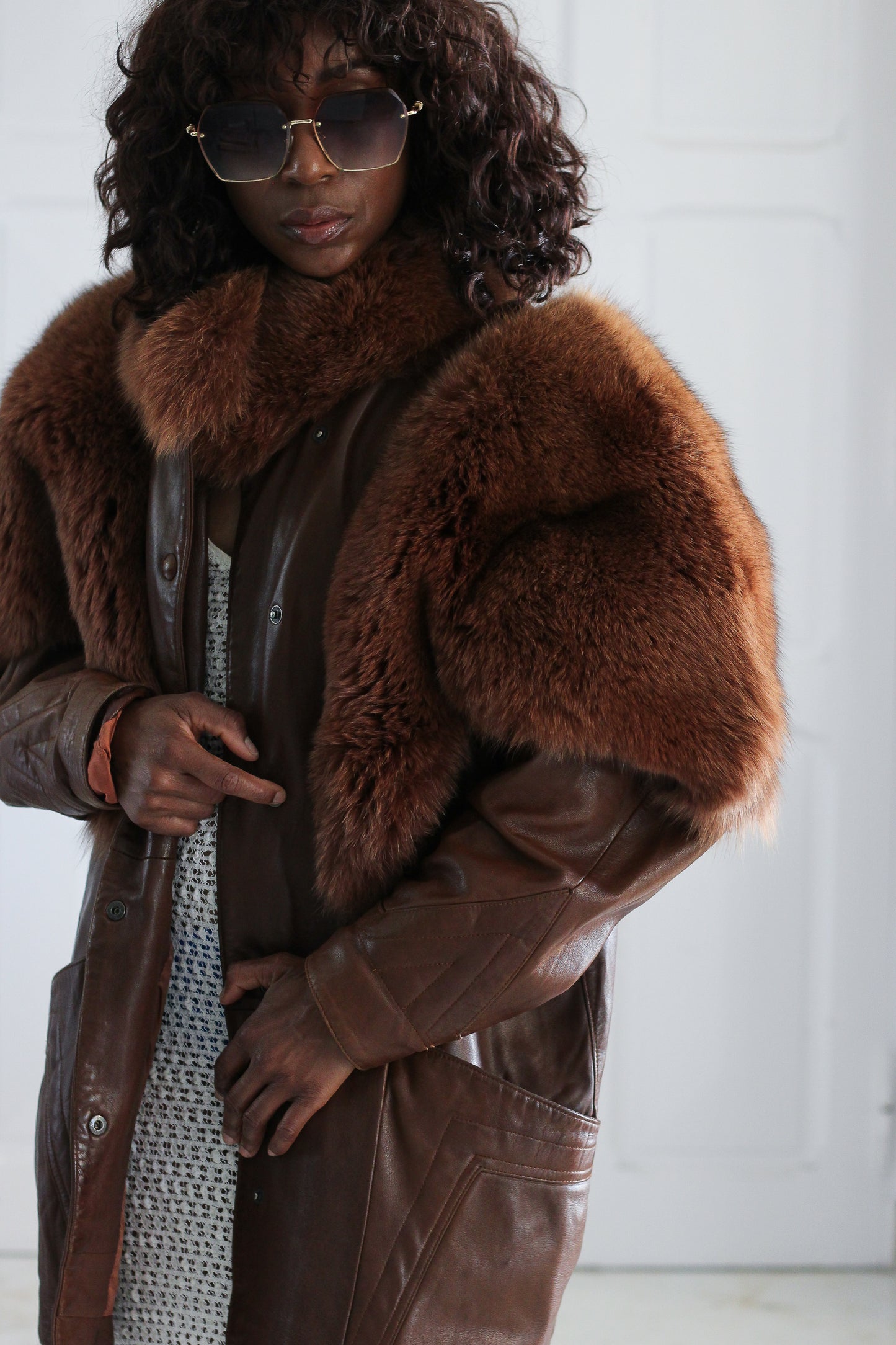 Blouson cuir et fourrure