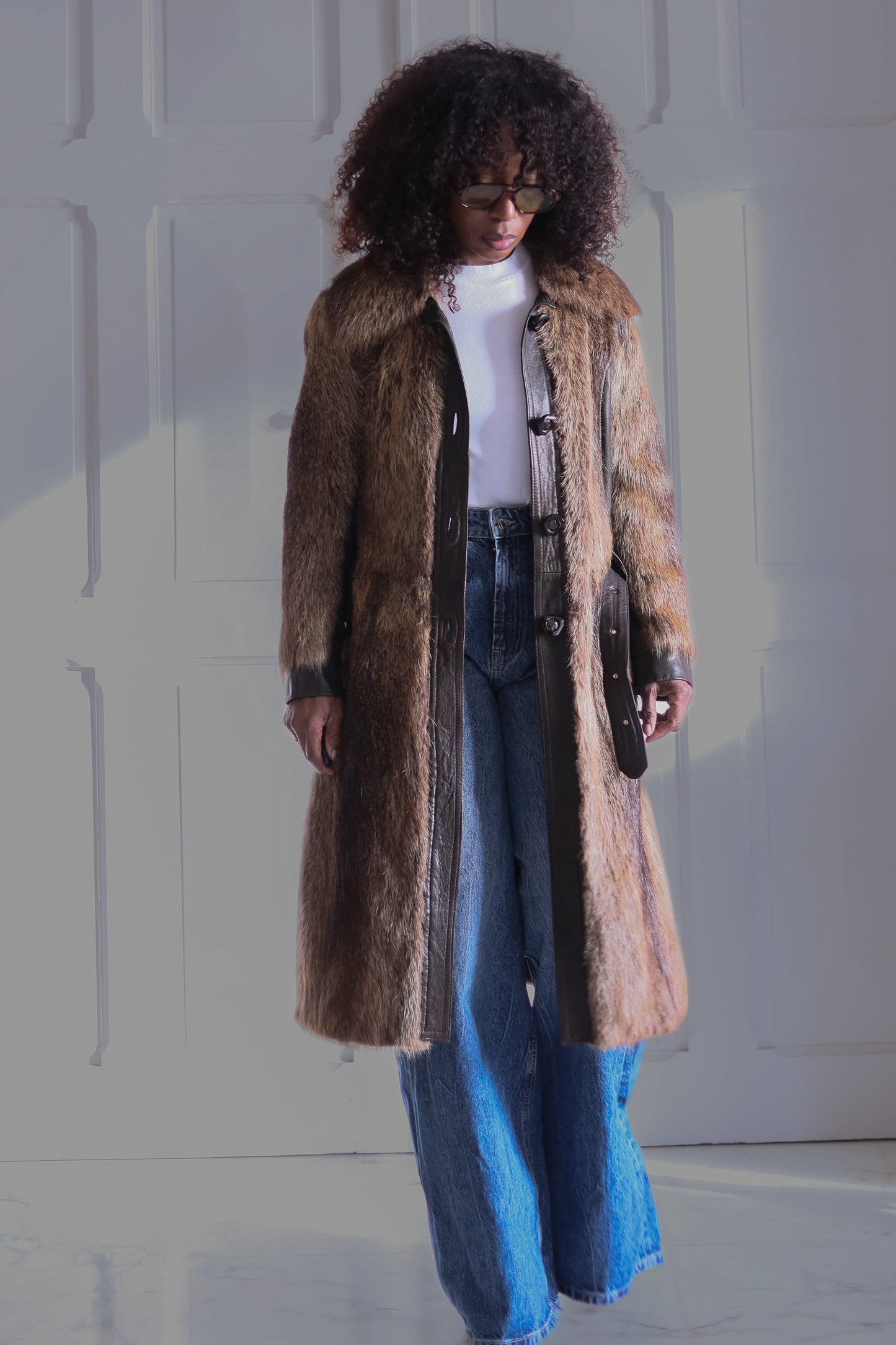 Manteau en fourrure et cuir