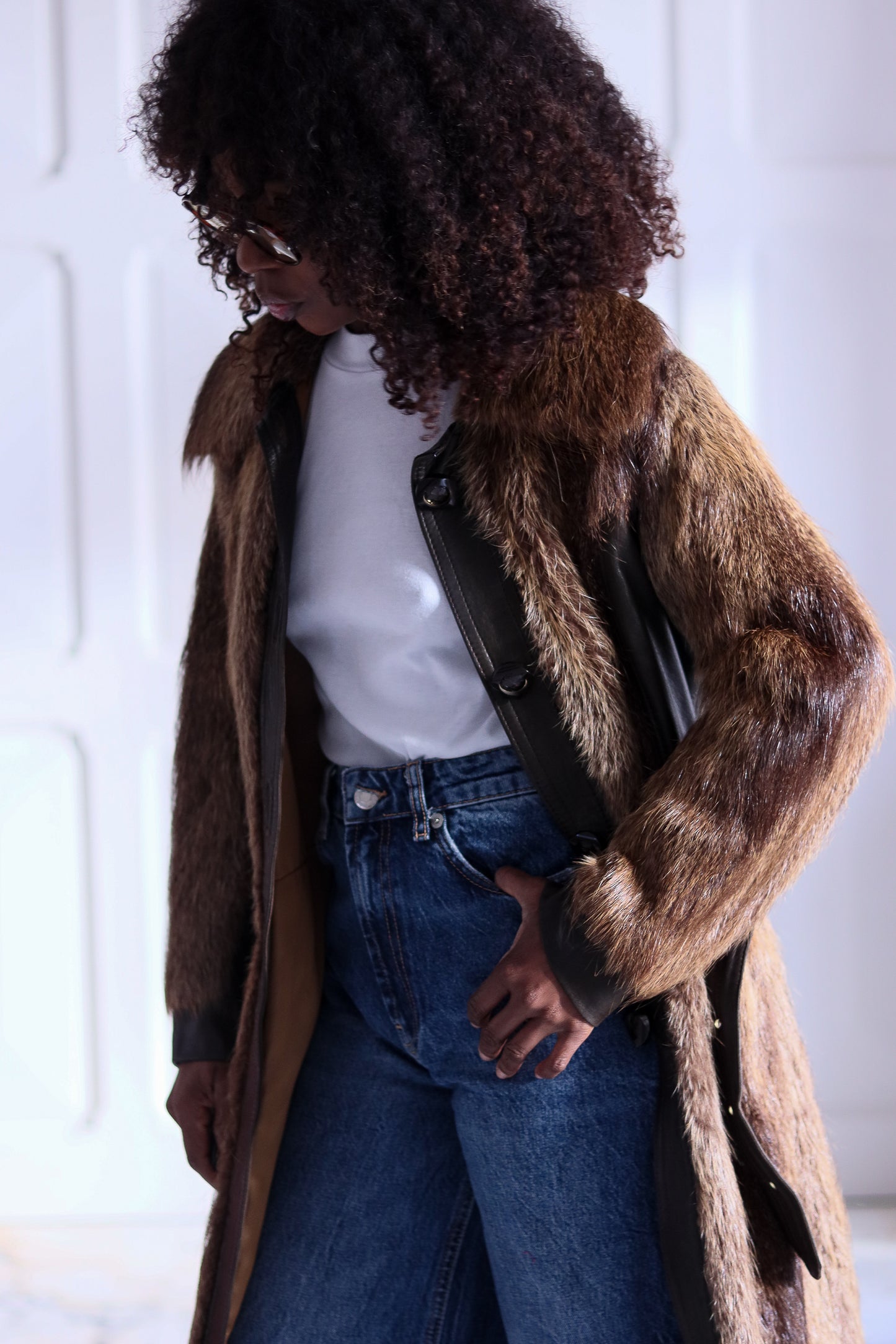 Manteau en fourrure et cuir