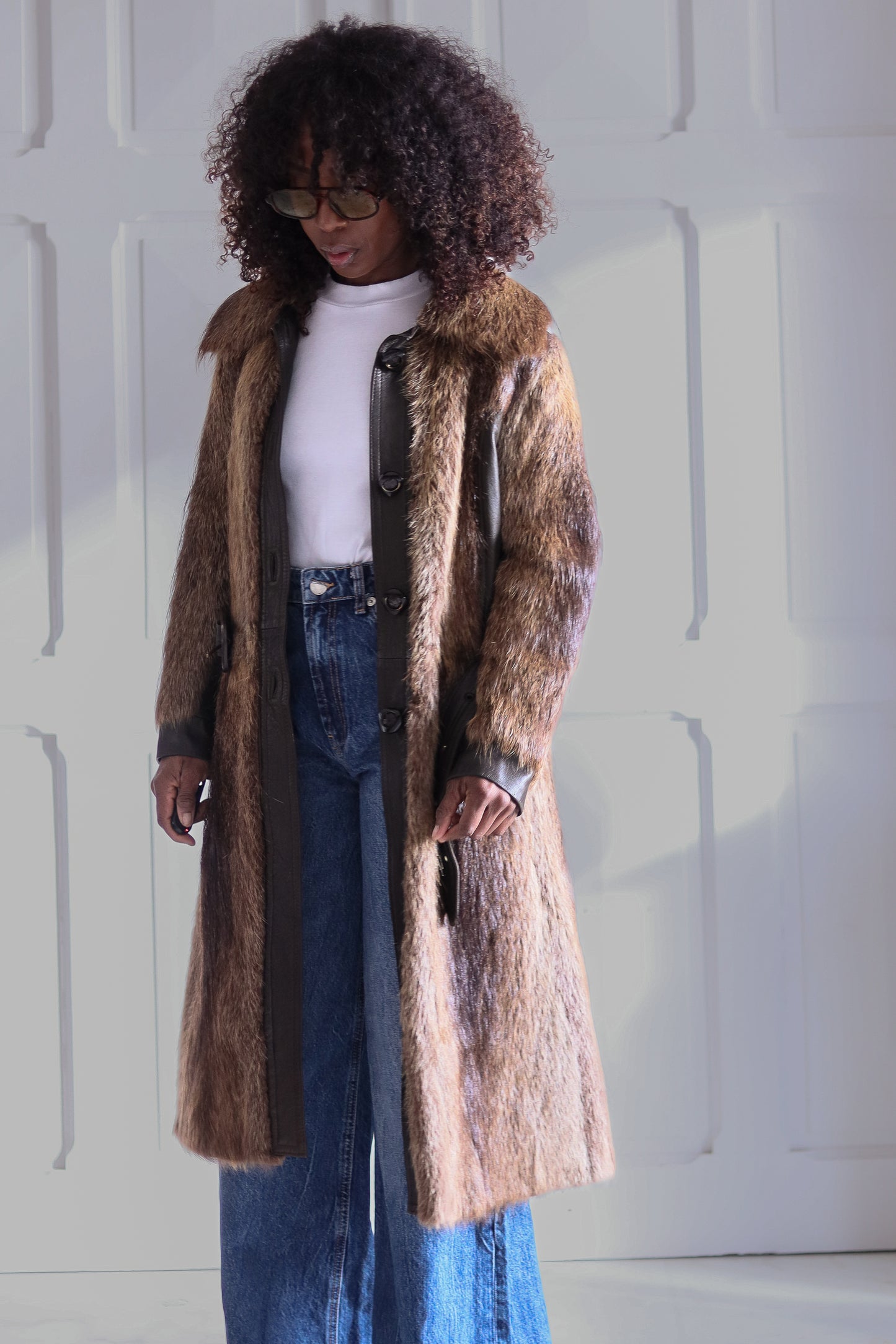 Manteau en fourrure et cuir