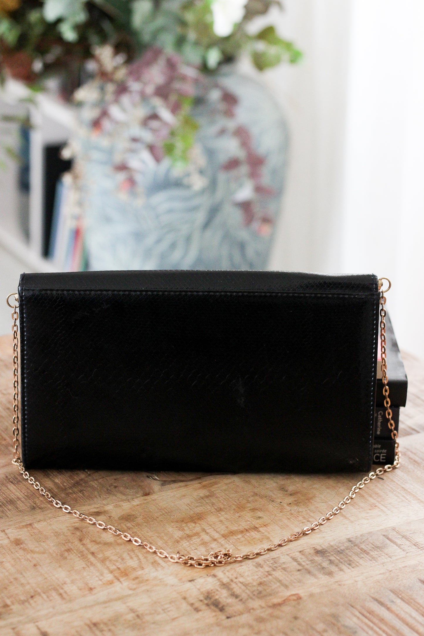 Pochette en cuir signé Chiu Wah
