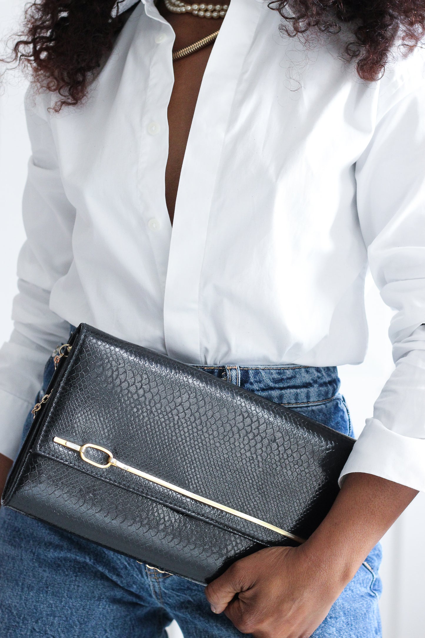 Pochette en cuir signé Chiu Wah