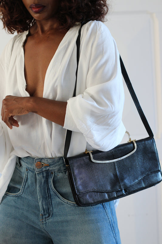 Sac à main pochette en cuir exotique