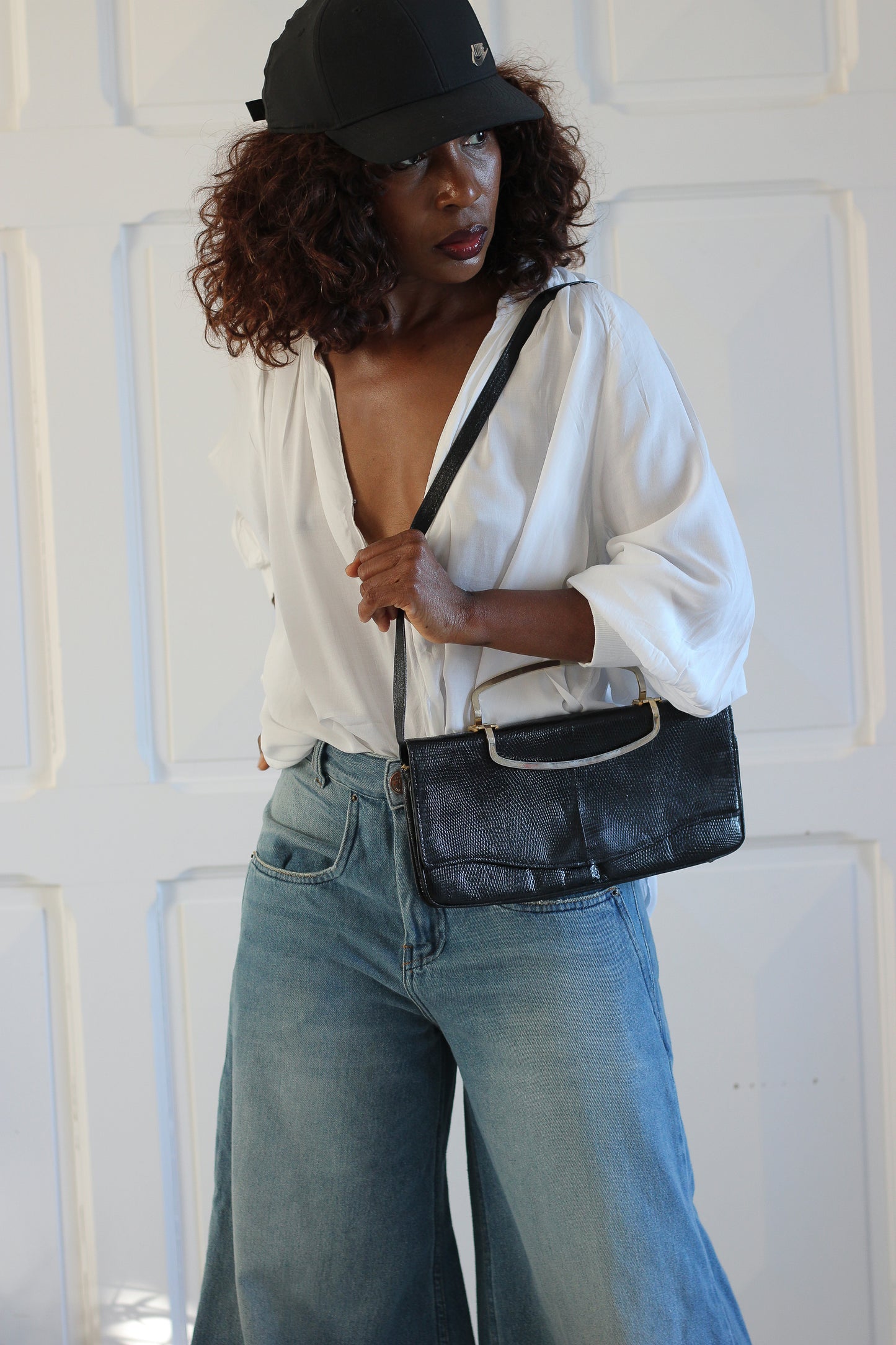 Sac à main pochette en cuir exotique