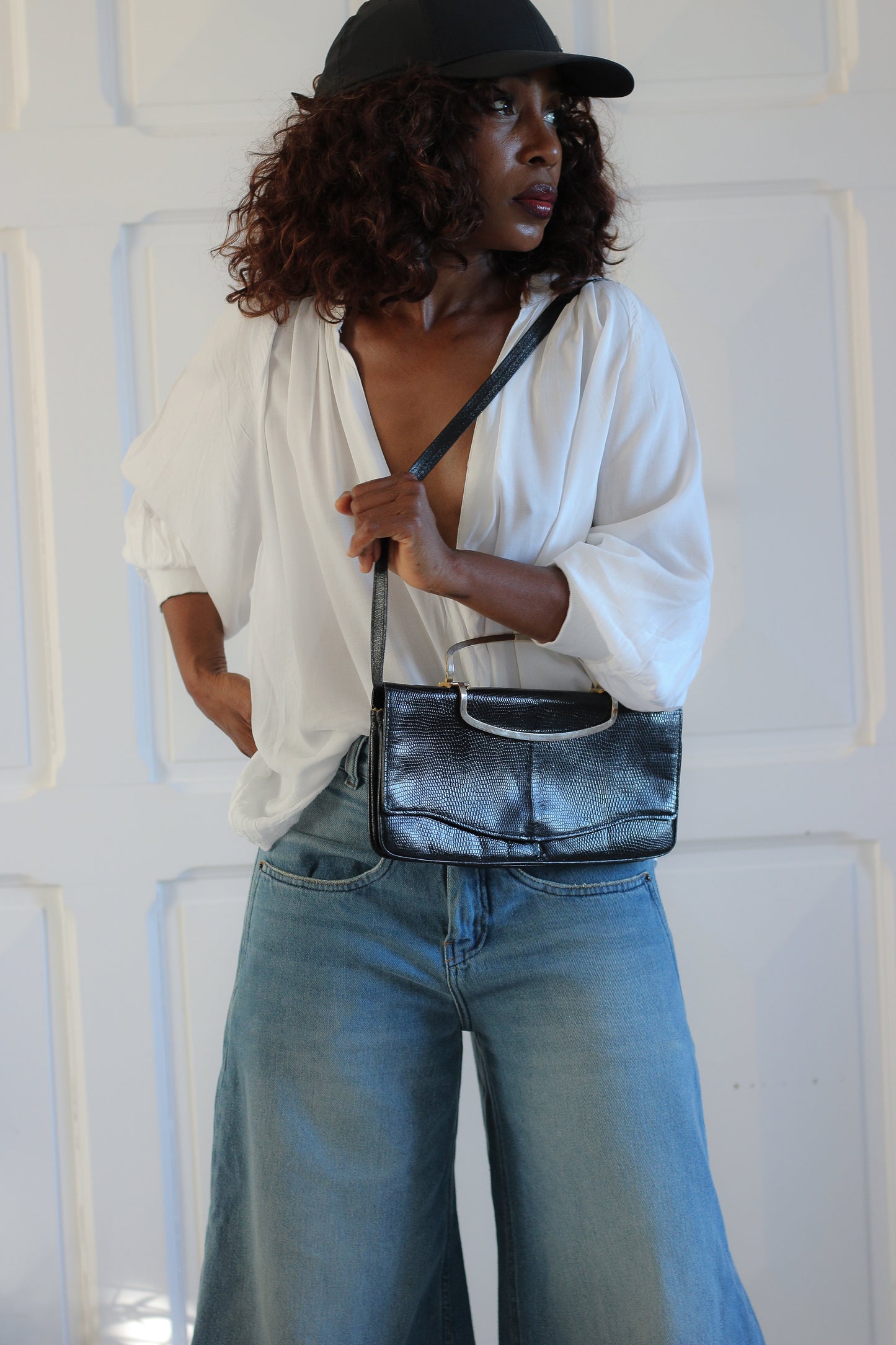 Sac à main pochette en cuir exotique
