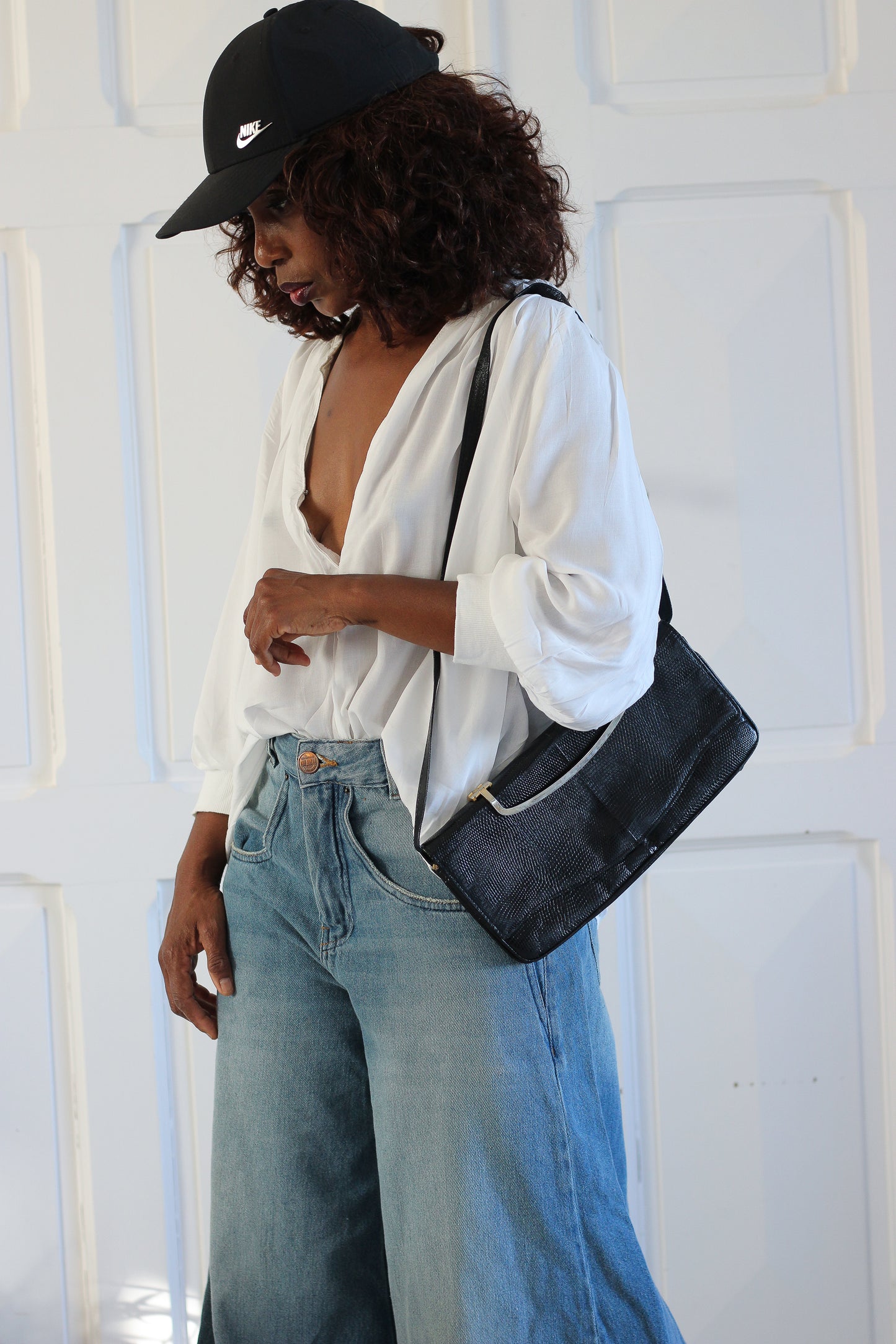 Sac à main pochette en cuir exotique
