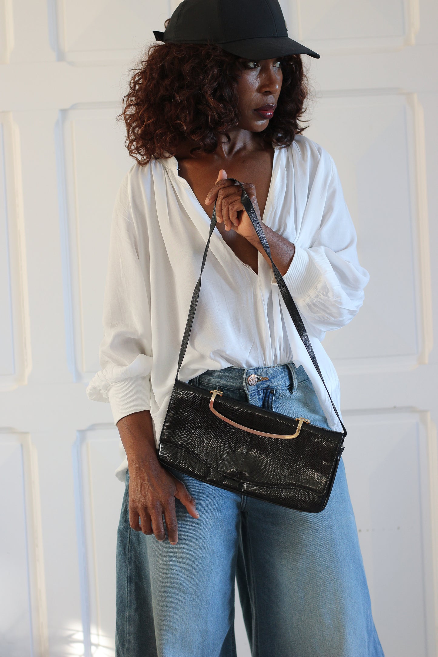 Sac à main pochette en cuir exotique