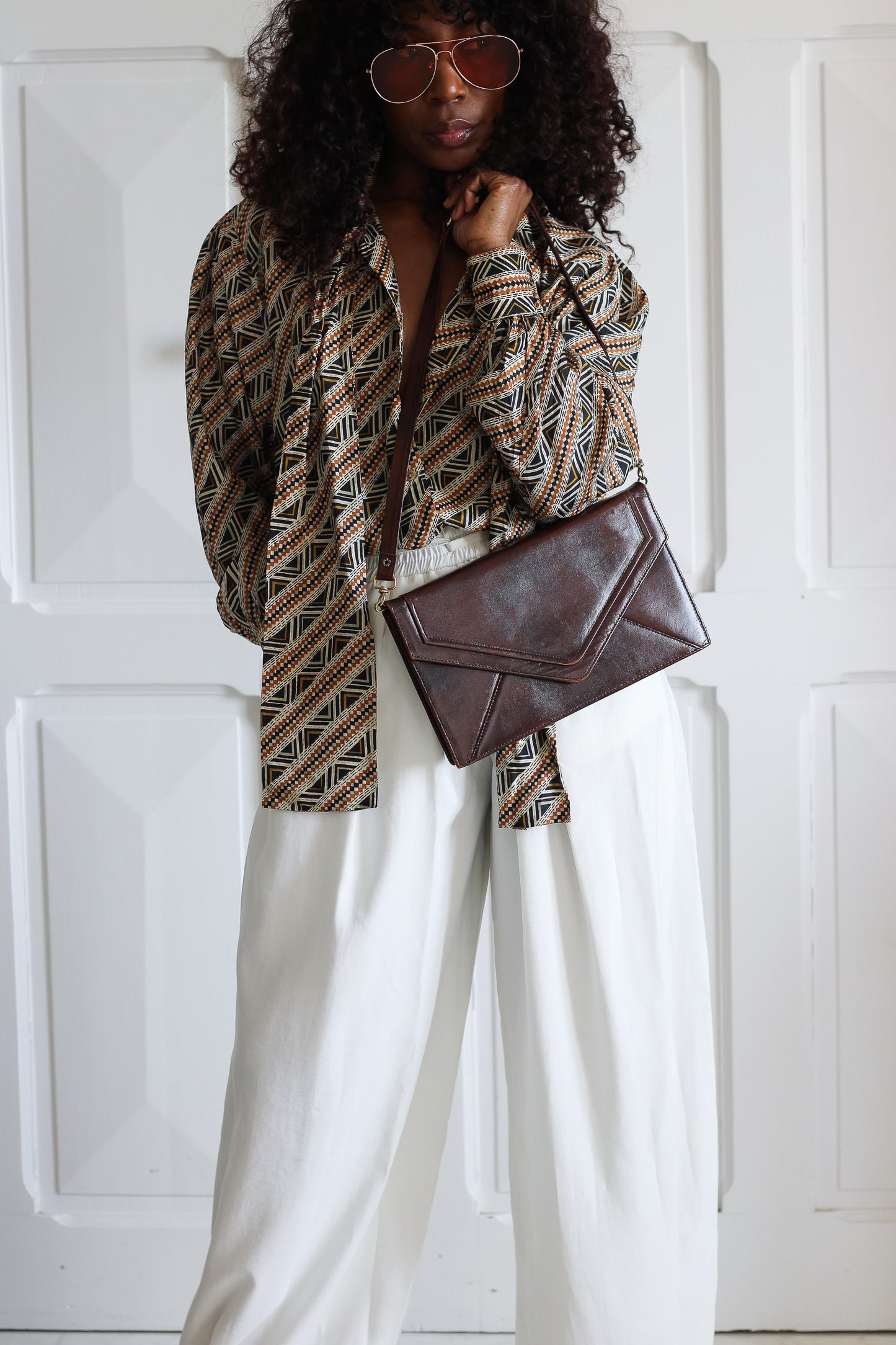 Pochette en cuir chocolat vintage
