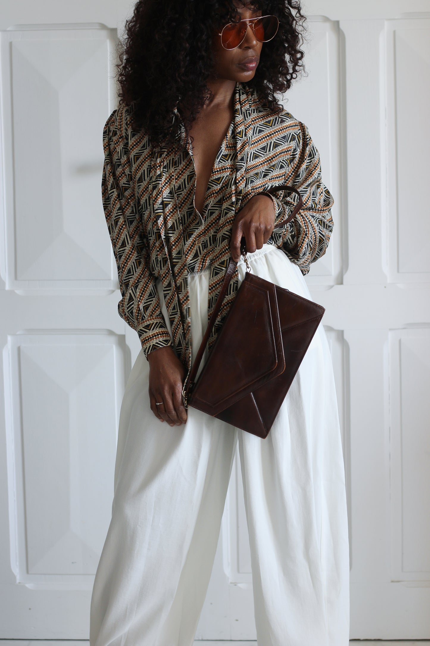 Pochette en cuir chocolat vintage