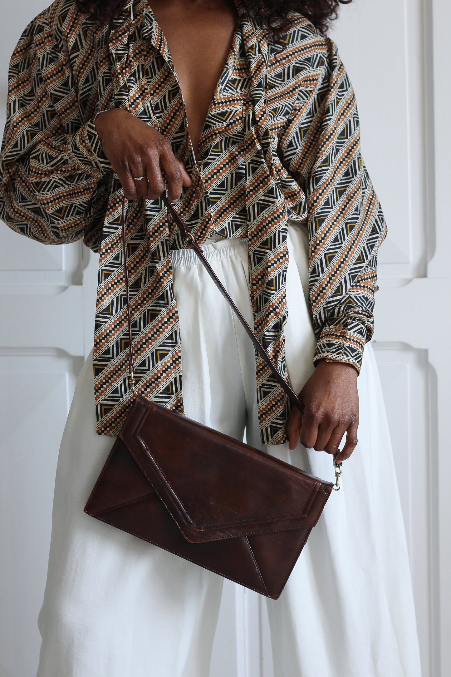Pochette en cuir chocolat vintage