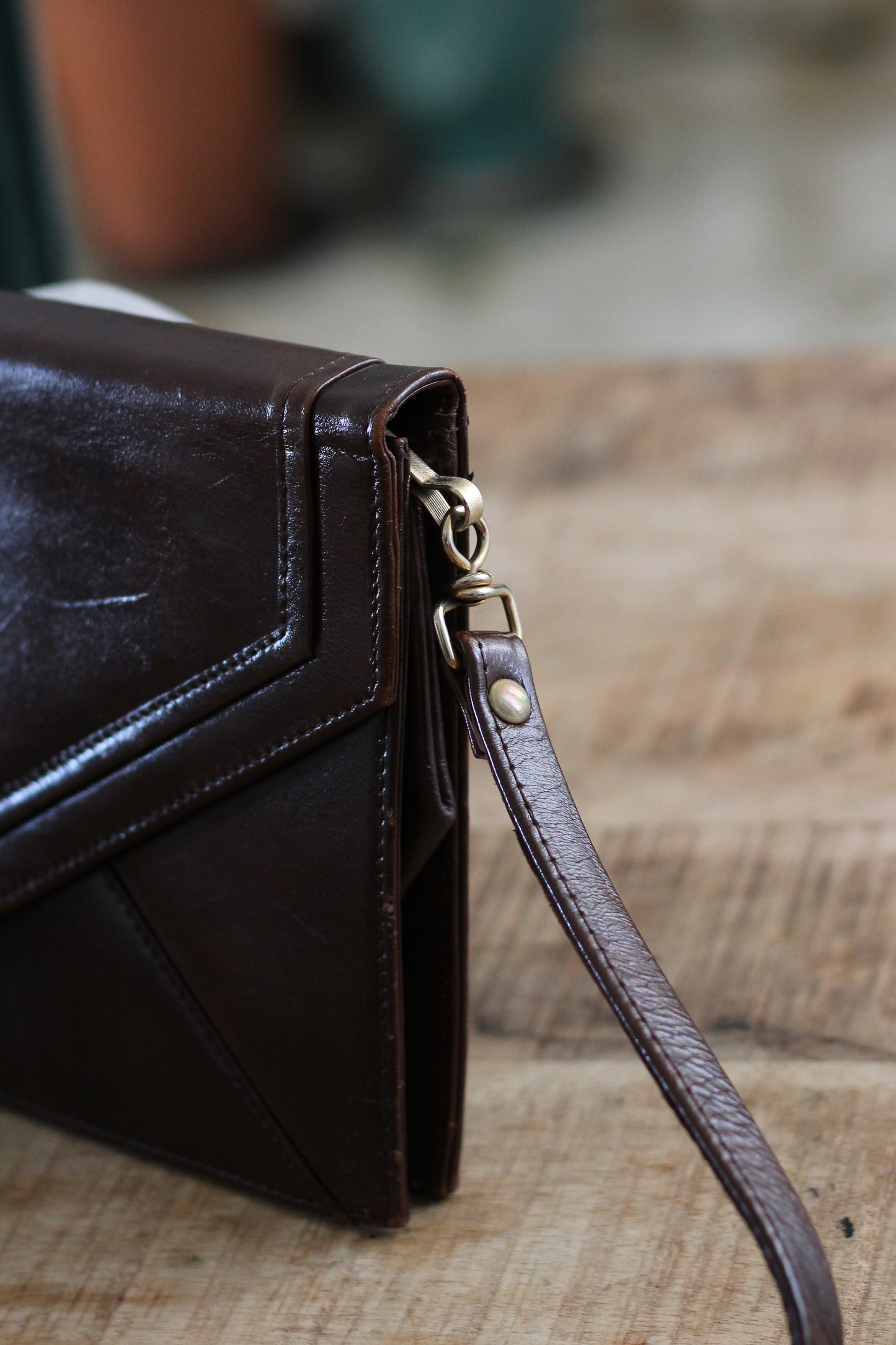 Pochette en cuir chocolat vintage