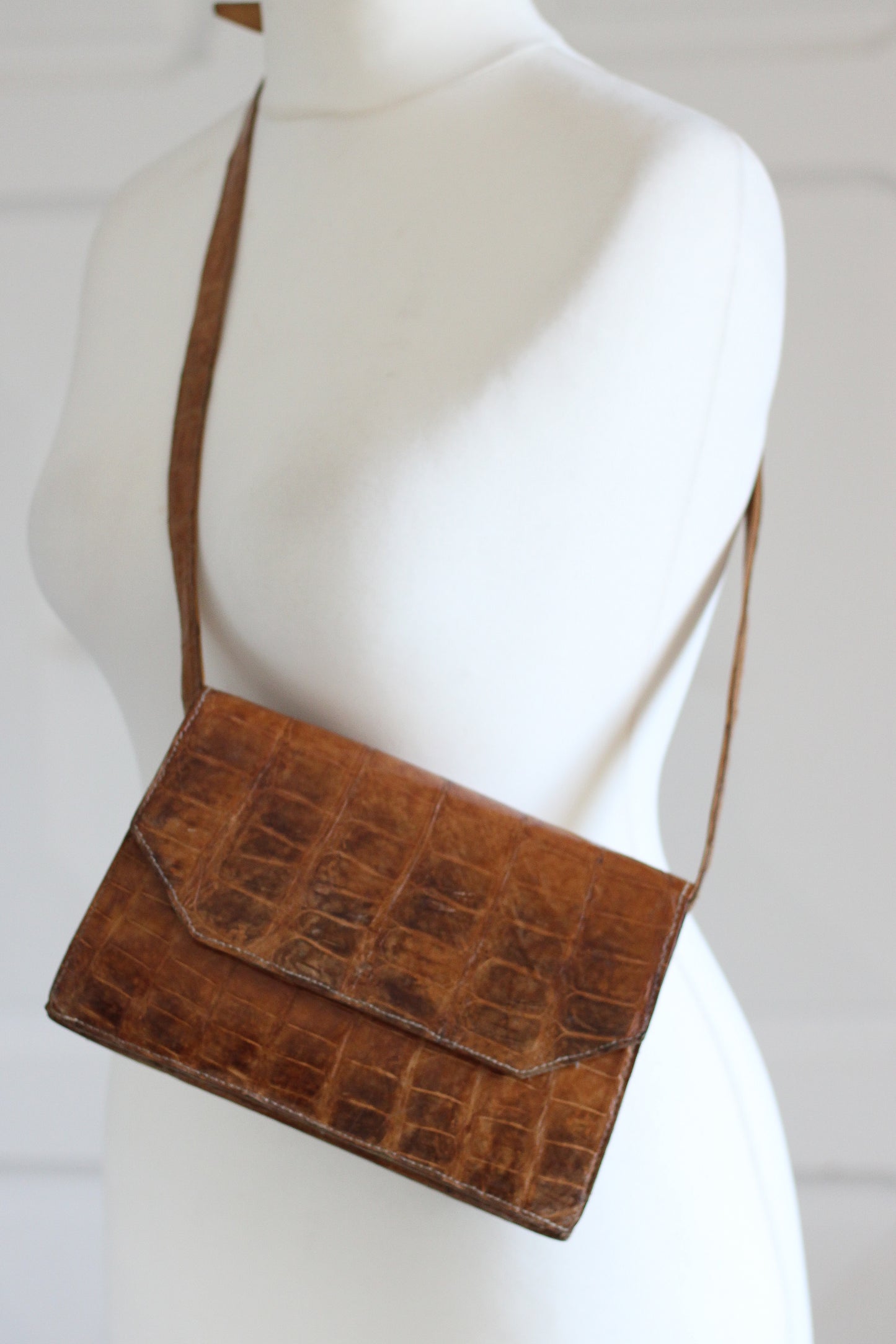 Sac pochette en cuir croco